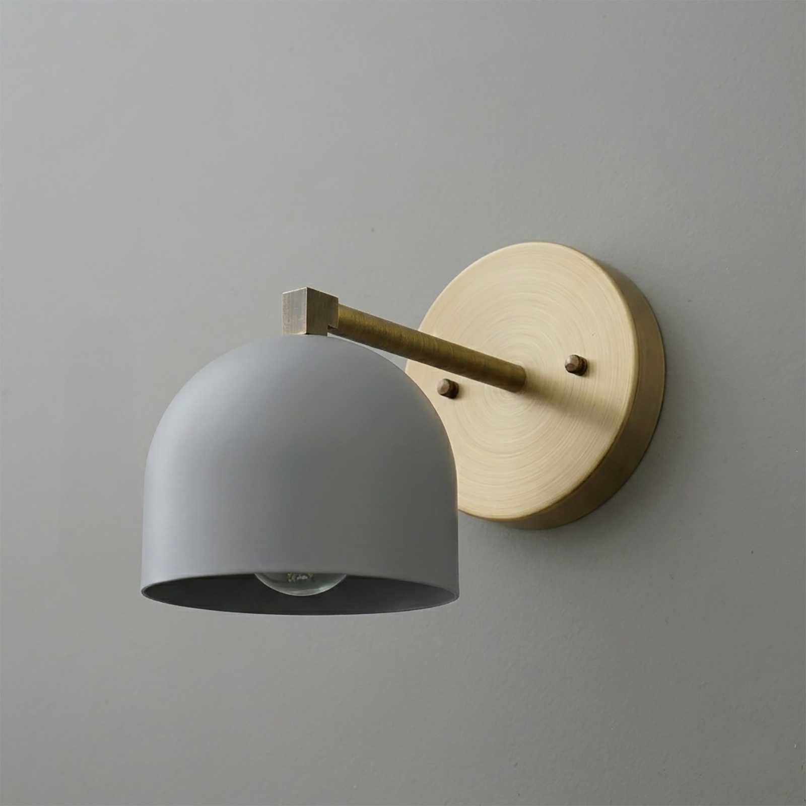 Matte gray dome-shaped metal shade with brass arm and round brass wall mount sconce. - SCONCE MODEL NO. 3622