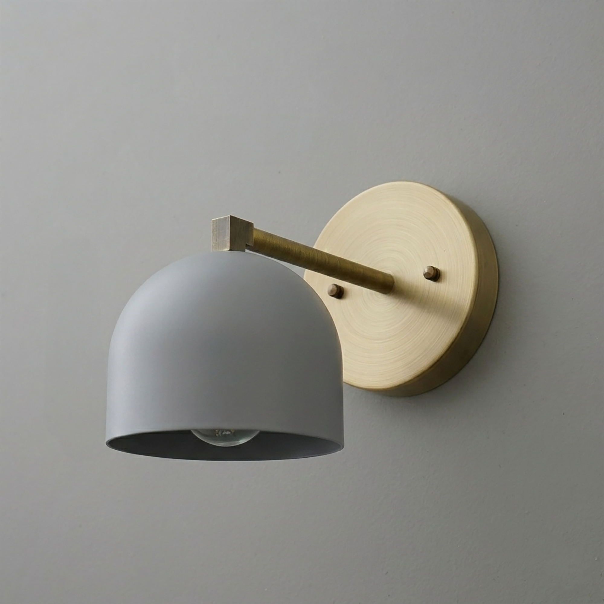 Matte gray dome-shaped metal shade with brass arm and round brass wall mount sconce. - SCONCE MODEL NO. 3622