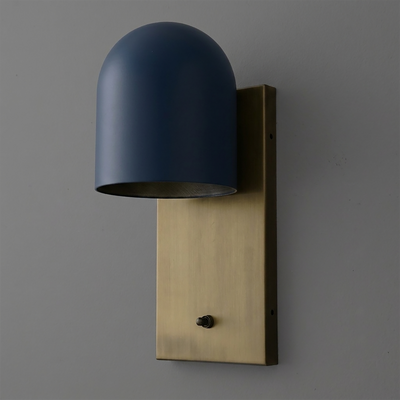 Wall sconce with matte blue rounded metal shade and rectangular brushed brass backplate with small black switch. - SCONCE MODEL NO. 6029