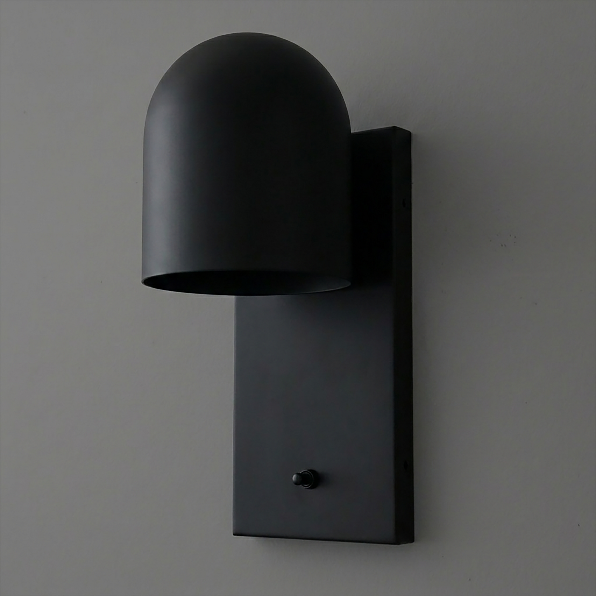 Matte black metal wall sconce with rounded dome shade and rectangular backplate. - SCONCE MODEL NO. 6029