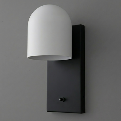 Black rectangular metal wall plate sconce with a smooth white dome-shaped shade and a small black toggle switch at the base. - SCONCE MODEL NO. 6029