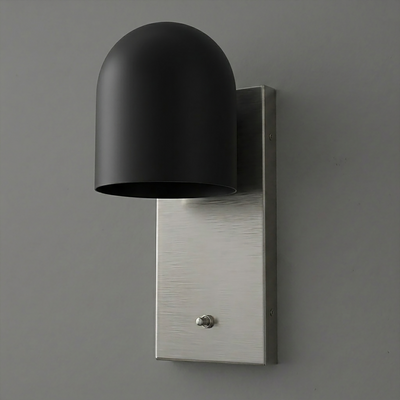 Matte black dome-shaped metal shade sconce on a brushed silver rectangular backplate with a small toggle switch. - SCONCE MODEL NO. 6029