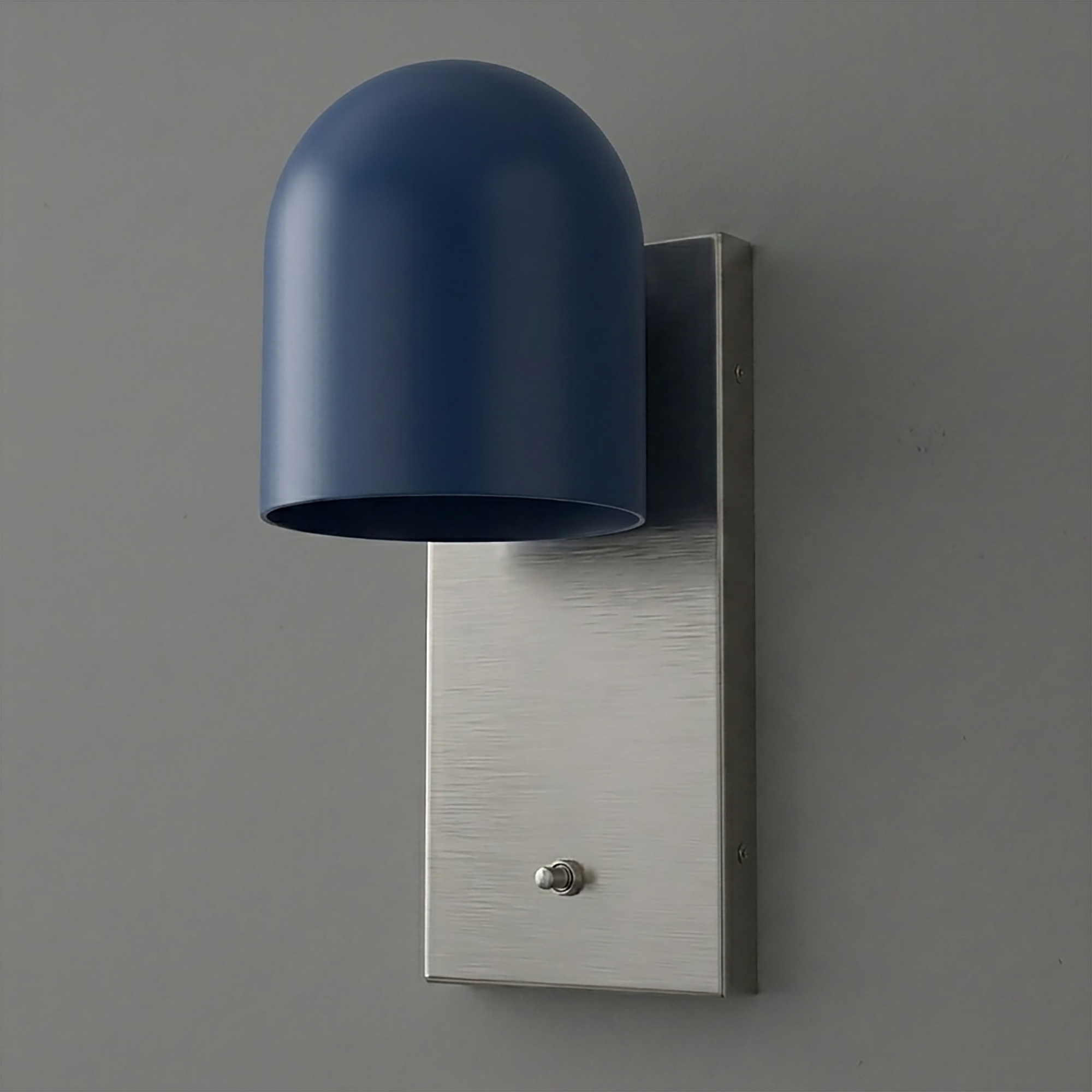Wall sconce with brushed metal rectangular base and matte blue dome-shaped shade covering one bulb. - SCONCE MODEL NO. 6029