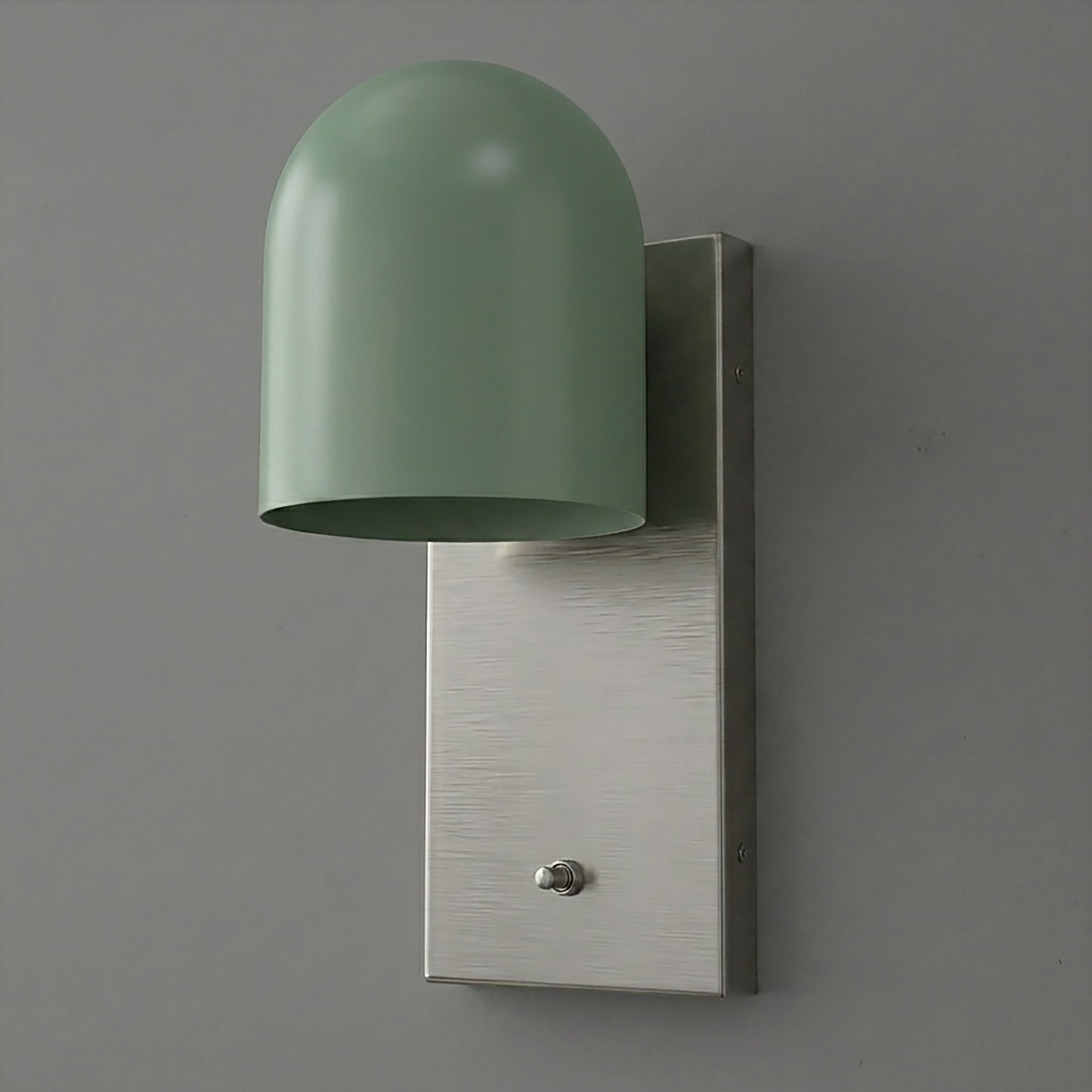 Wall sconce with matte sage green dome shade and brushed metal rectangular backplate with small toggle switch. - SCONCE MODEL NO. 6029