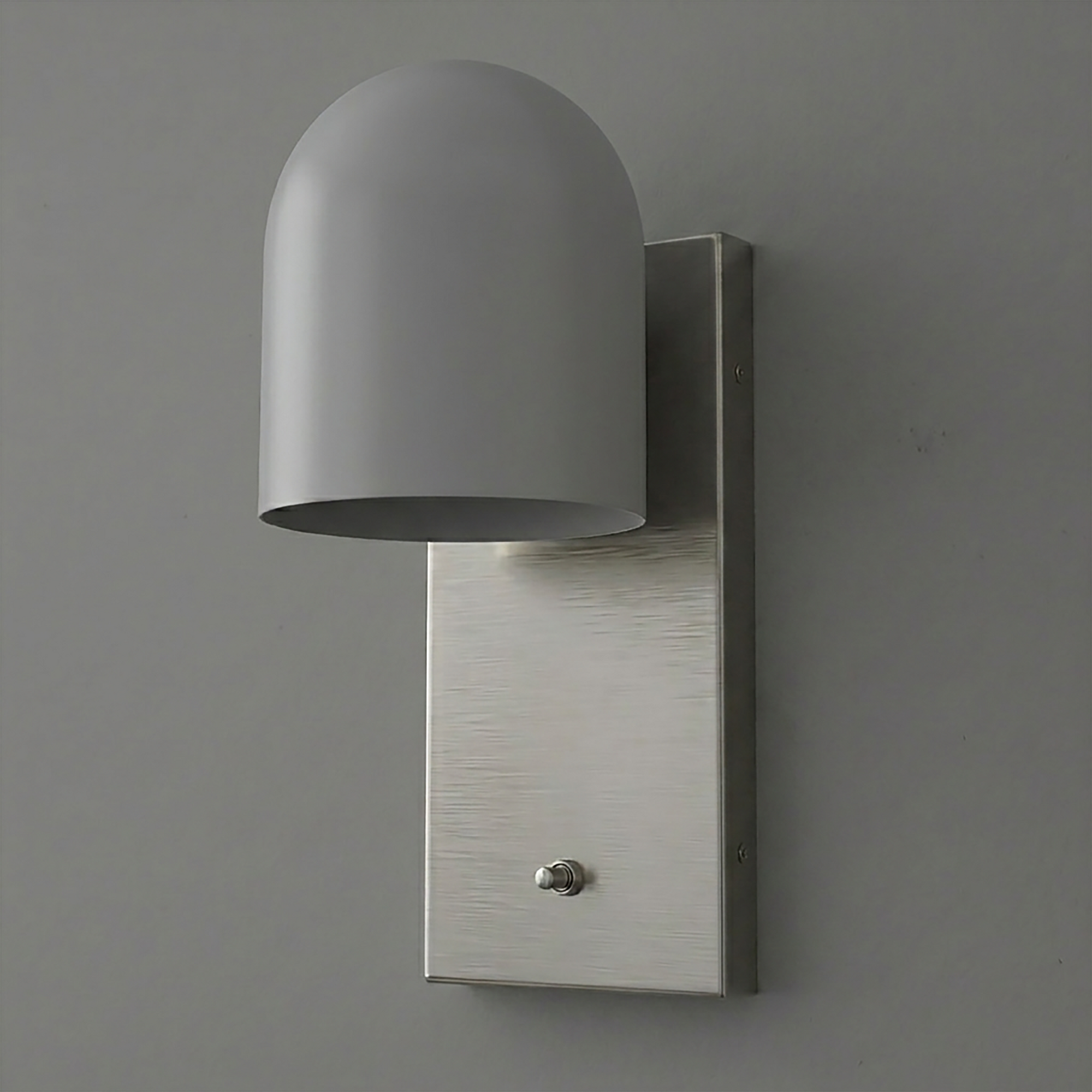Matte gray dome-shaped metal sconce with rectangular brushed nickel backplate and single bulb design. - SCONCE MODEL NO. 6029