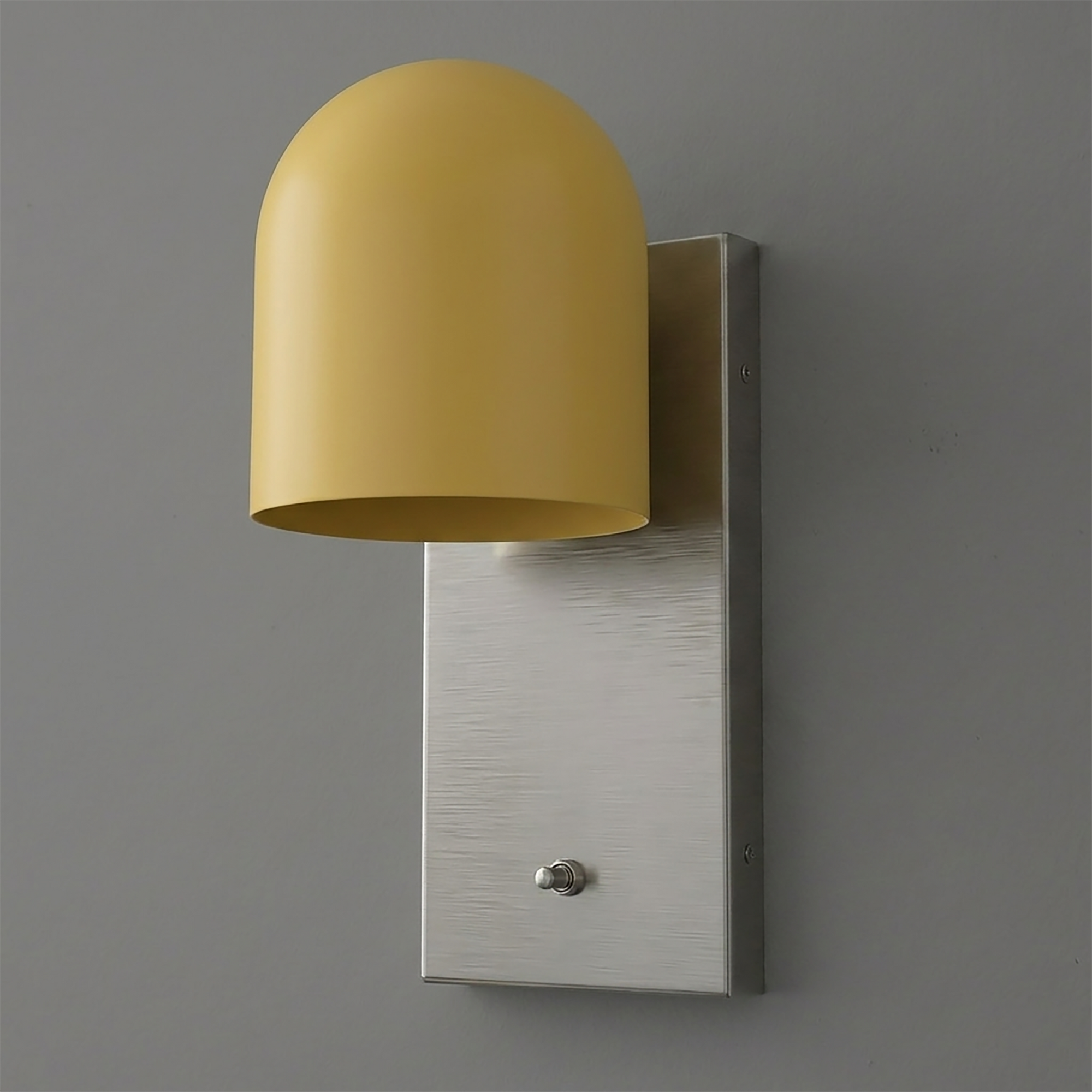 Modern wall sconce with a brushed metal rectangular base and a smooth matte yellow dome-shaped shade. - SCONCE MODEL NO. 6029