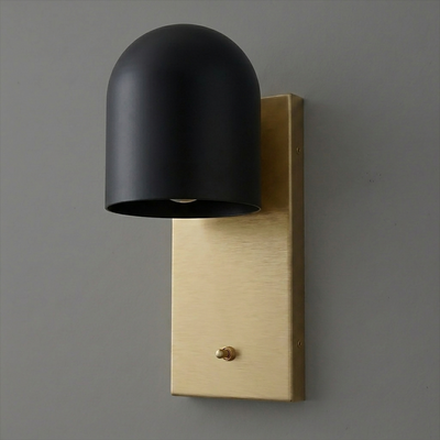 Black dome-shaped metal shade wall sconce with rectangular brushed gold backplate and small toggle switch. - SCONCE MODEL NO. 6029