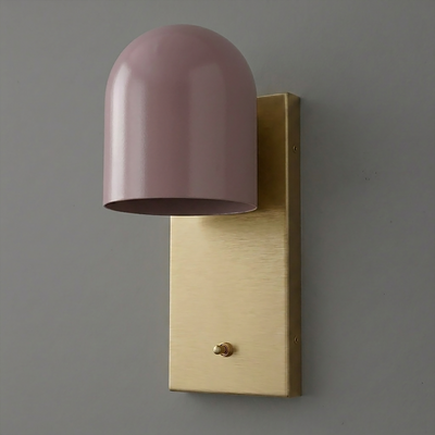 Wall sconce with brushed brass rectangular base and smooth matte pink dome-shaped shade. - SCONCE MODEL NO. 6029