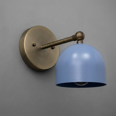 Wall sconce with a round antique brass base and arm, featuring a smooth, matte light blue dome shade. - SCONCE MODEL NO. 5103