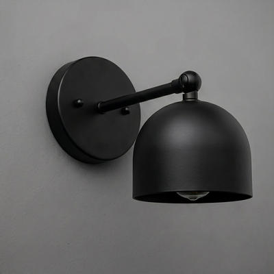 Matte black metal wall sconce with round backplate and dome-shaped shade, single bulb design. - SCONCE MODEL NO. 5103