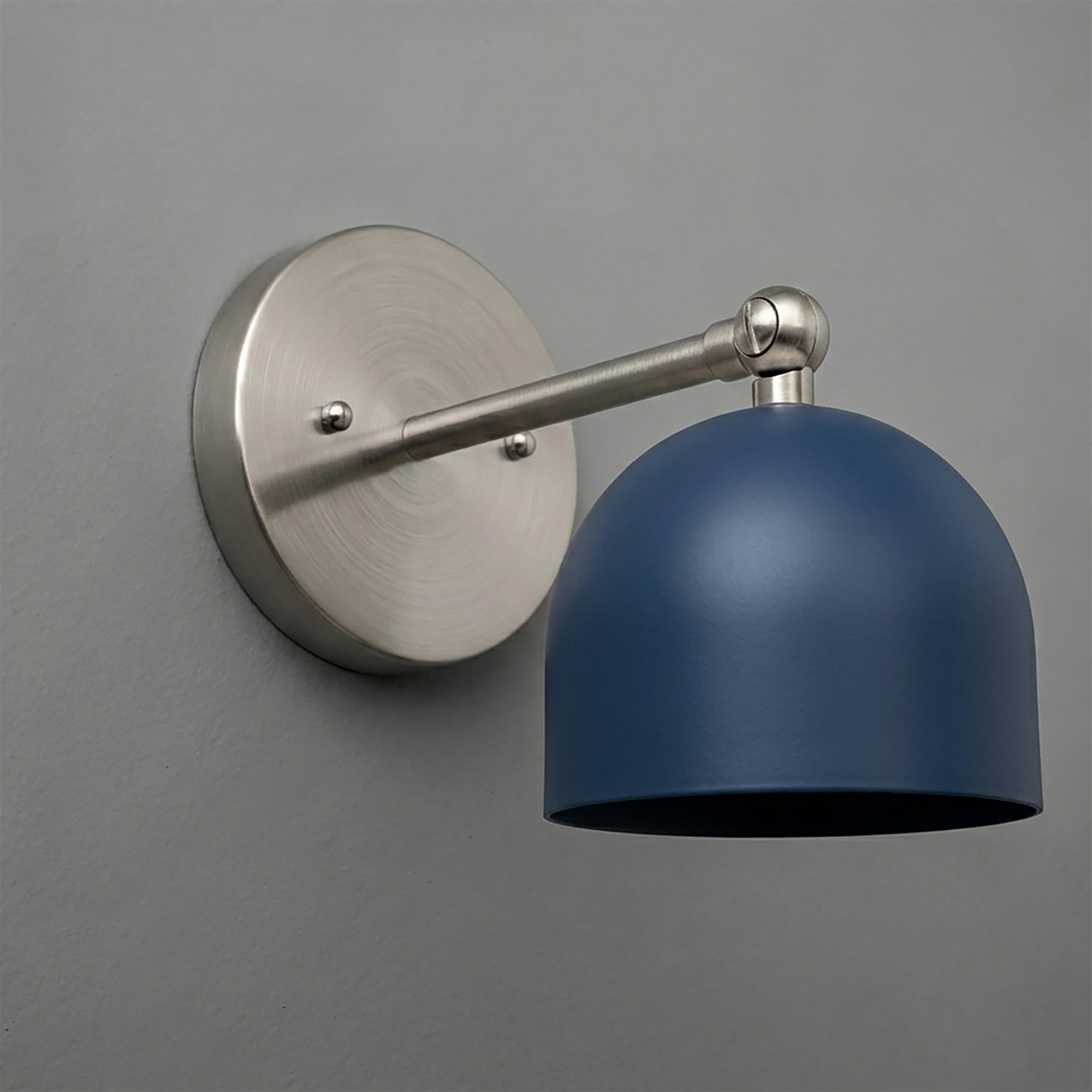 Brushed nickel wall sconce with a single matte navy blue dome shade and adjustable arm. - SCONCE MODEL NO. 5103