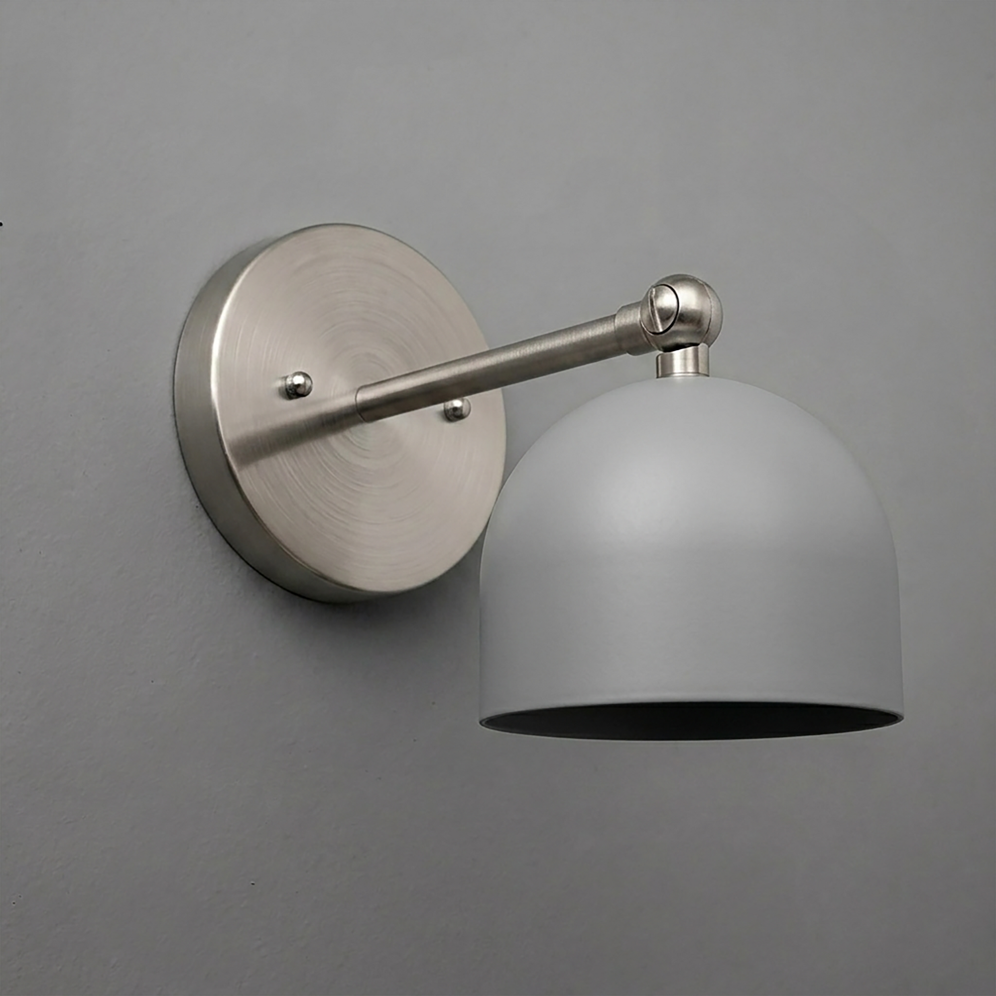 Brushed nickel 1-bulb wall sconce with round backplate and frosted dome lampshade. - SCONCE MODEL NO. 5103