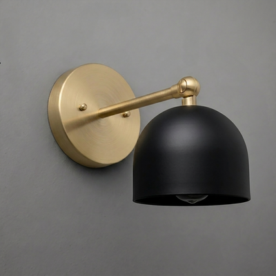 Wall-mounted sconce with a matte black dome shade and brushed brass arm and round base. - SCONCE MODEL NO. 5103