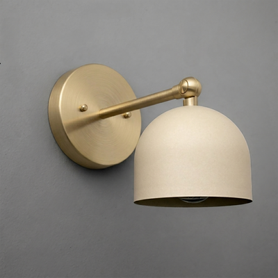 Wall sconce with a matte gold round base and arm, featuring a dome-shaped beige lampshade. - SCONCE MODEL NO. 5103