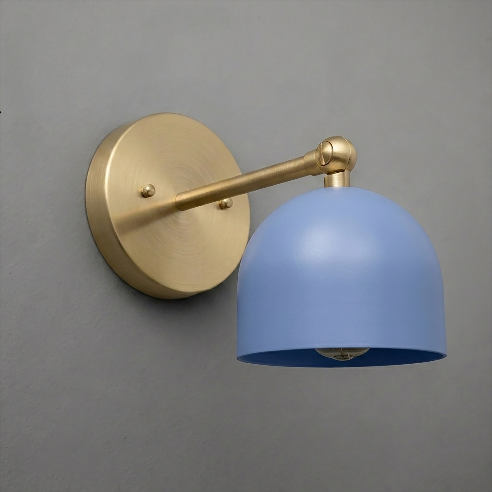 Wall-mounted sconce with matte blue dome shade and brushed brass arm and baseplate. - SCONCE MODEL NO. 5103