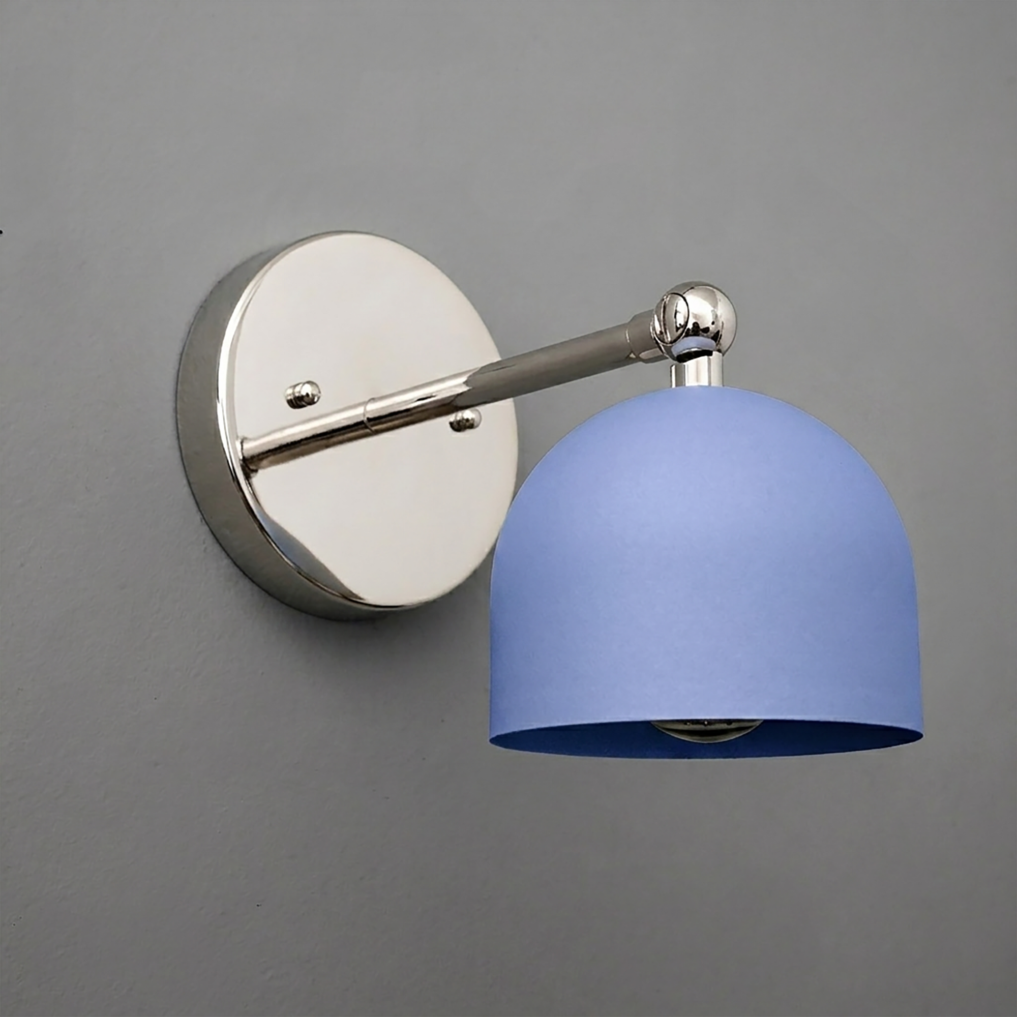 Wall-mounted sconce with a polished silver metal base and arm, featuring a smooth matte blue dome-shaped shade. - SCONCE MODEL NO. 5103