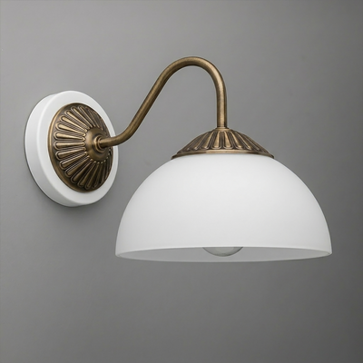 Wall-mounted sconce with white dome glass shade and antique brass curved arm and decorative backplate. - SCONCE MODEL NO. 9408