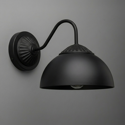Matte black metal wall sconce with round backplate and curved arm supporting a dome-shaped shade. - SCONCE MODEL NO. 9408