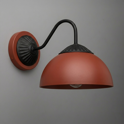 Matte rust-colored metal dome shade wall sconce with black curved arm and decorative black wall mount. - SCONCE MODEL NO. 9408