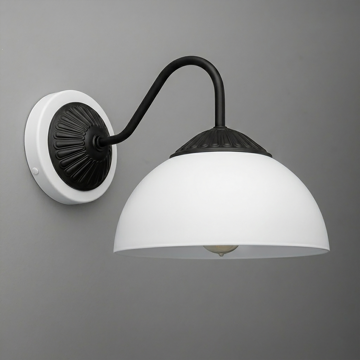 Black metal wall sconce with curved arm and white dome glass shade mounting on a white round base. - SCONCE MODEL NO. 9408