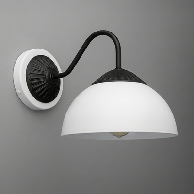 Black metal wall sconce with curved arm and white dome glass shade mounting on a white round base. - SCONCE MODEL NO. 9408