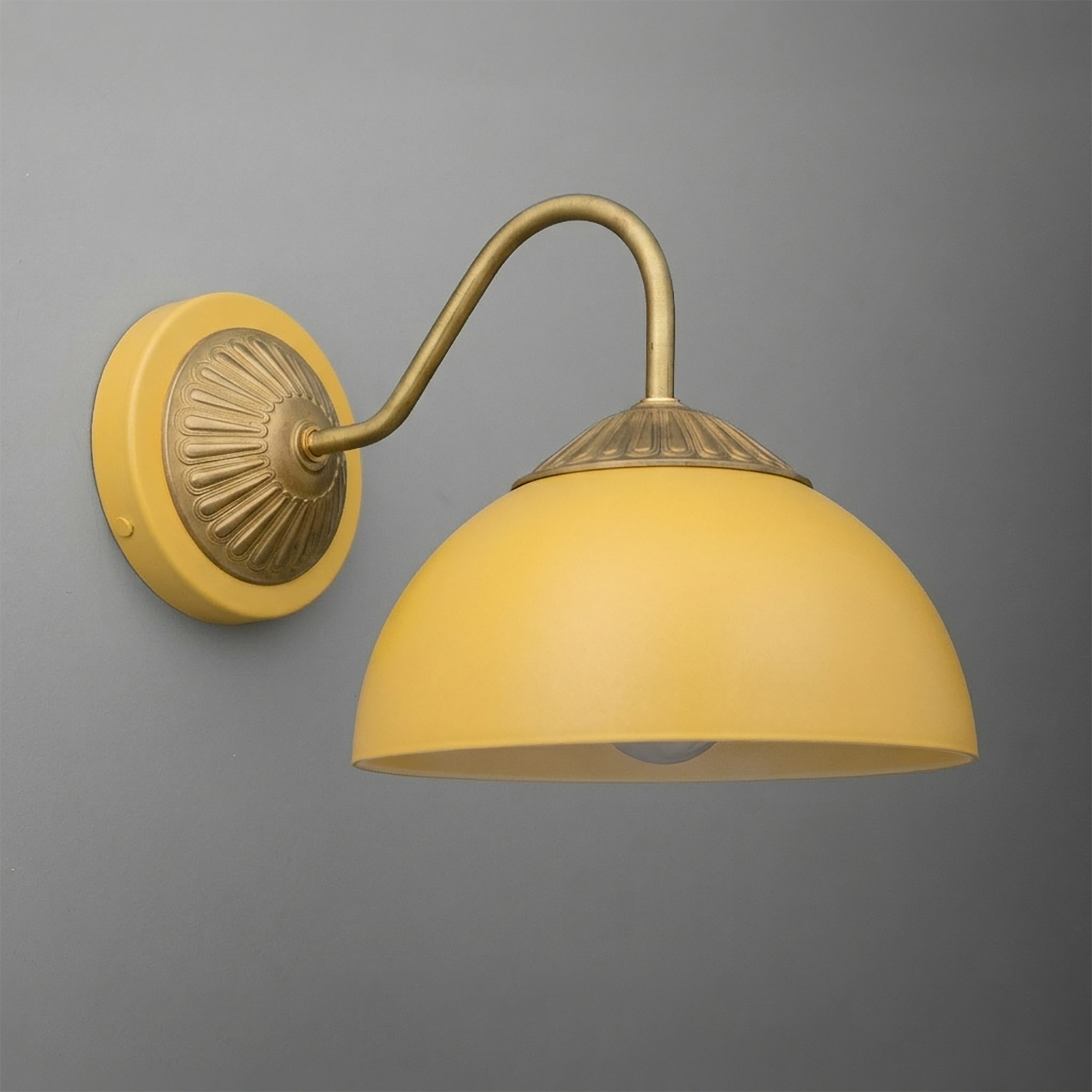 Yellow dome-shaped wall sconce with a curved bronze arm and decorative round base. - SCONCE MODEL NO. 9408
