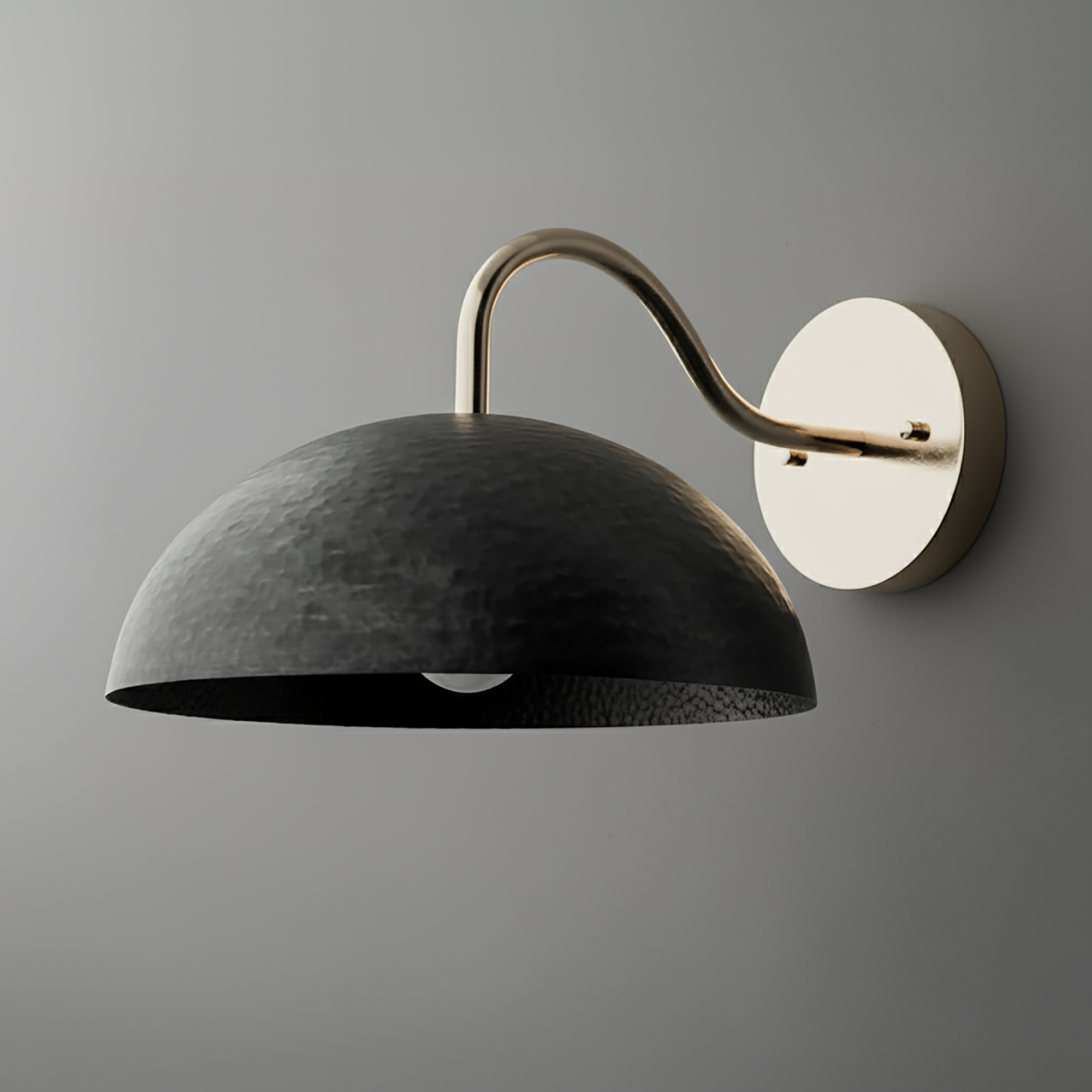 Black hammered metal dome sconce with curved brass arm and round brass wall mount. - SCONCE MODEL NO. 9874