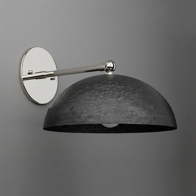 Wall-mounted sconce with a polished silver circular base and arm, featuring a large textured black metal dome shade. - SCONCE MODEL NO. 3164