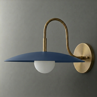 Wall sconce with matte navy blue dome-shaped shade, frosted globe bulb, and brushed brass curved arm and round base plate. - SCONCE MODEL NO. 9171