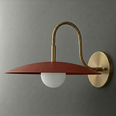 Wall sconce with matte red wide flat metal shade, frosted globe bulb, and brushed brass curved arm and baseplate. - SCONCE MODEL NO. 9171