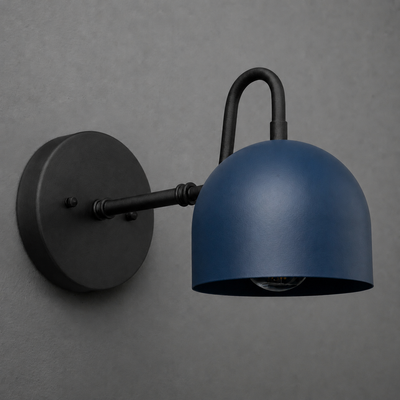 Wall-mounted sconce with matte black arm and round base, featuring a deep blue dome-shaped metal shade. - SCONCE MODEL NO. 3628