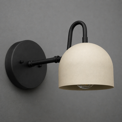 Matte black metal wall sconce with curved arm and smooth beige dome-shaped shade. - SCONCE MODEL NO. 3628