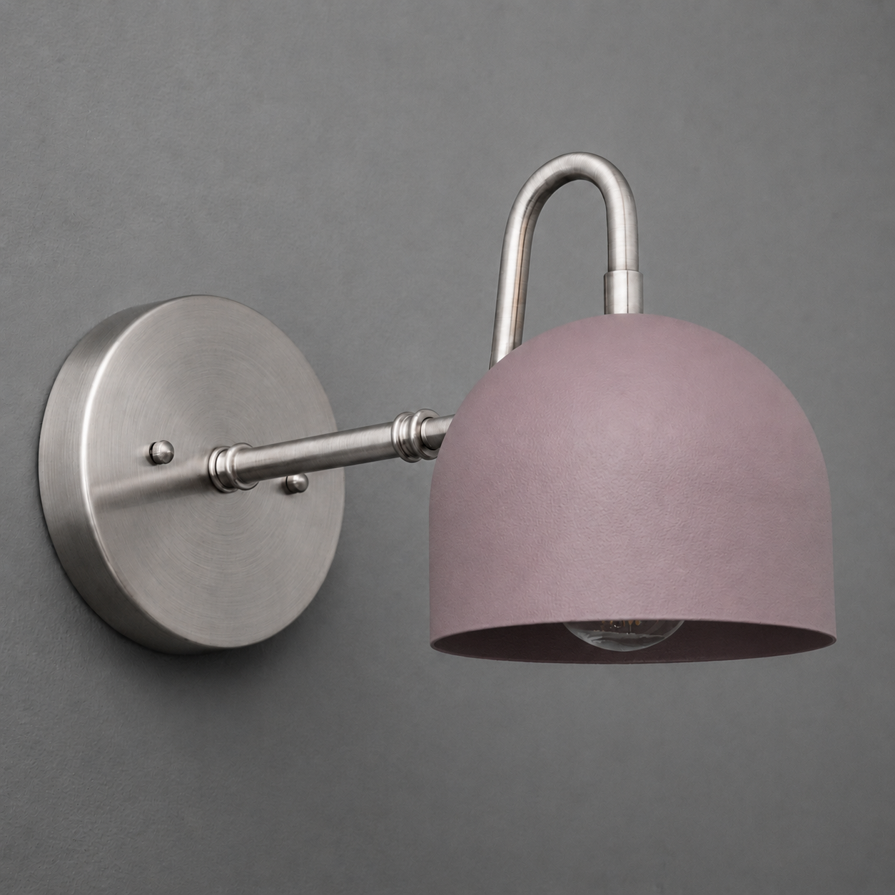 Matte silver metal wall sconce with curved arm and dome-shaped muted purple shade covering one bulb. - SCONCE MODEL NO. 3628