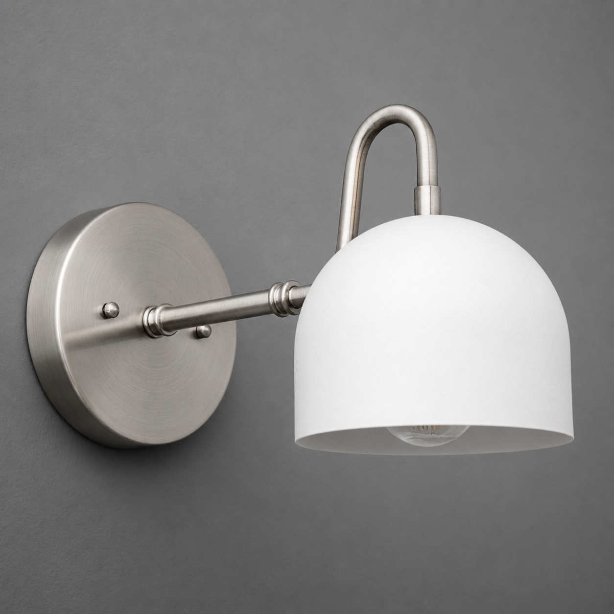 Brushed nickel wall sconce with a round backplate and a white dome-shaped glass shade. - SCONCE MODEL NO. 3628