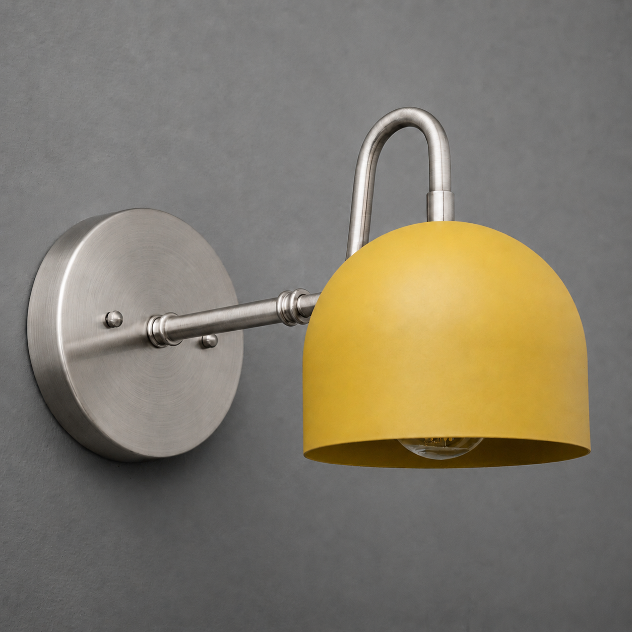 Wall-mounted sconce with matte yellow dome shade and brushed metal arm and round base. - SCONCE MODEL NO. 3628