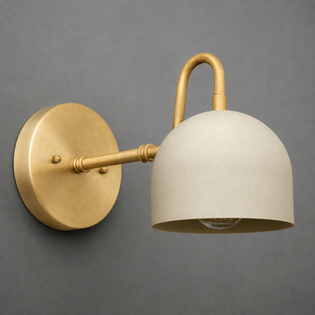 Brushed brass 1-bulb sconce with a curved arm and matte off-white dome shade. - SCONCE MODEL NO. 3628