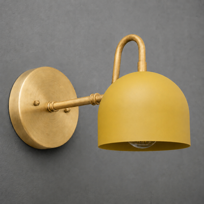 Brushed brass wall sconce with matte mustard yellow dome shade and sleek curved arm. - SCONCE MODEL NO. 3628