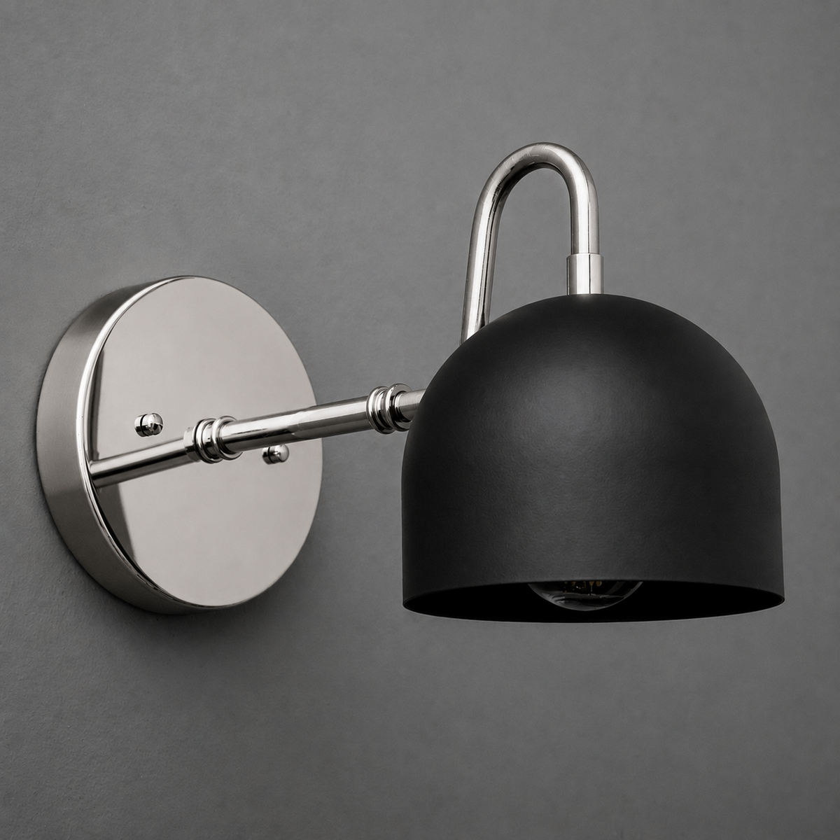 Matte black dome-shaped metal sconce with brushed nickel round wall mount and arm. - SCONCE MODEL NO. 3628