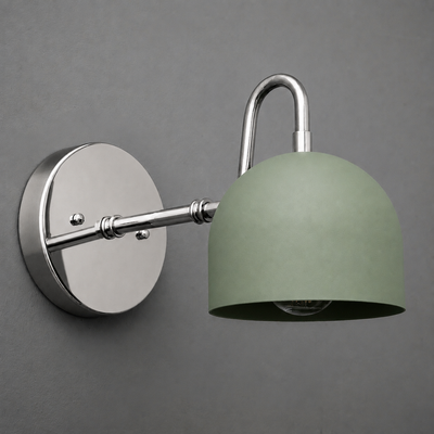 Wall sconce with matte silver circular base and arm, featuring a muted green dome-shaped metal shade. - SCONCE MODEL NO. 3628
