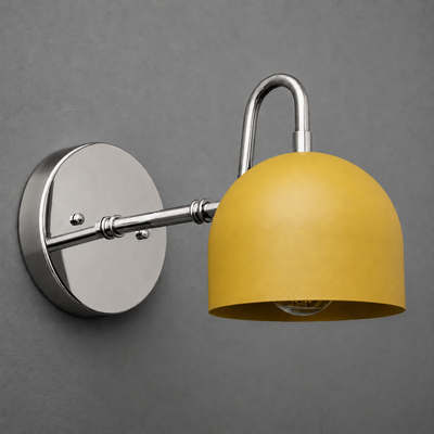 Wall-mounted sconce with brushed metal base and curved arm holding a matte mustard yellow dome-shaped shade. - SCONCE MODEL NO. 3628