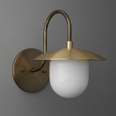 Antique brass wall sconce with curved arm and white frosted glass shade with flat, wide brass top. - SCONCE MODEL NO. 7191