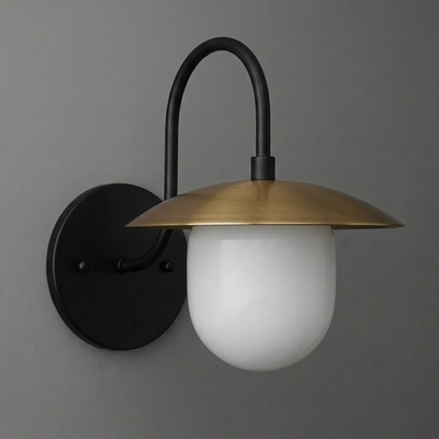 Wall-mounted sconce with black metal arm, round backplate, brass dome shade, and white frosted glass bulb cover. - SCONCE MODEL NO. 7191