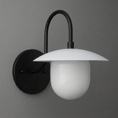 Black metal wall sconce with curved arm and white dome-shaped glass shade. - SCONCE MODEL NO. 7191