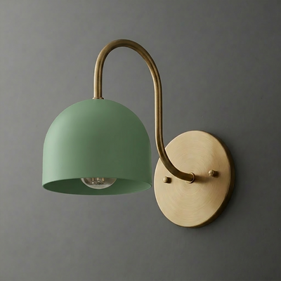 Wall sconce with matte green dome-shaped shade and curved antique brass arm mounted on round brass backplate. - SCONCE MODEL NO. 6308