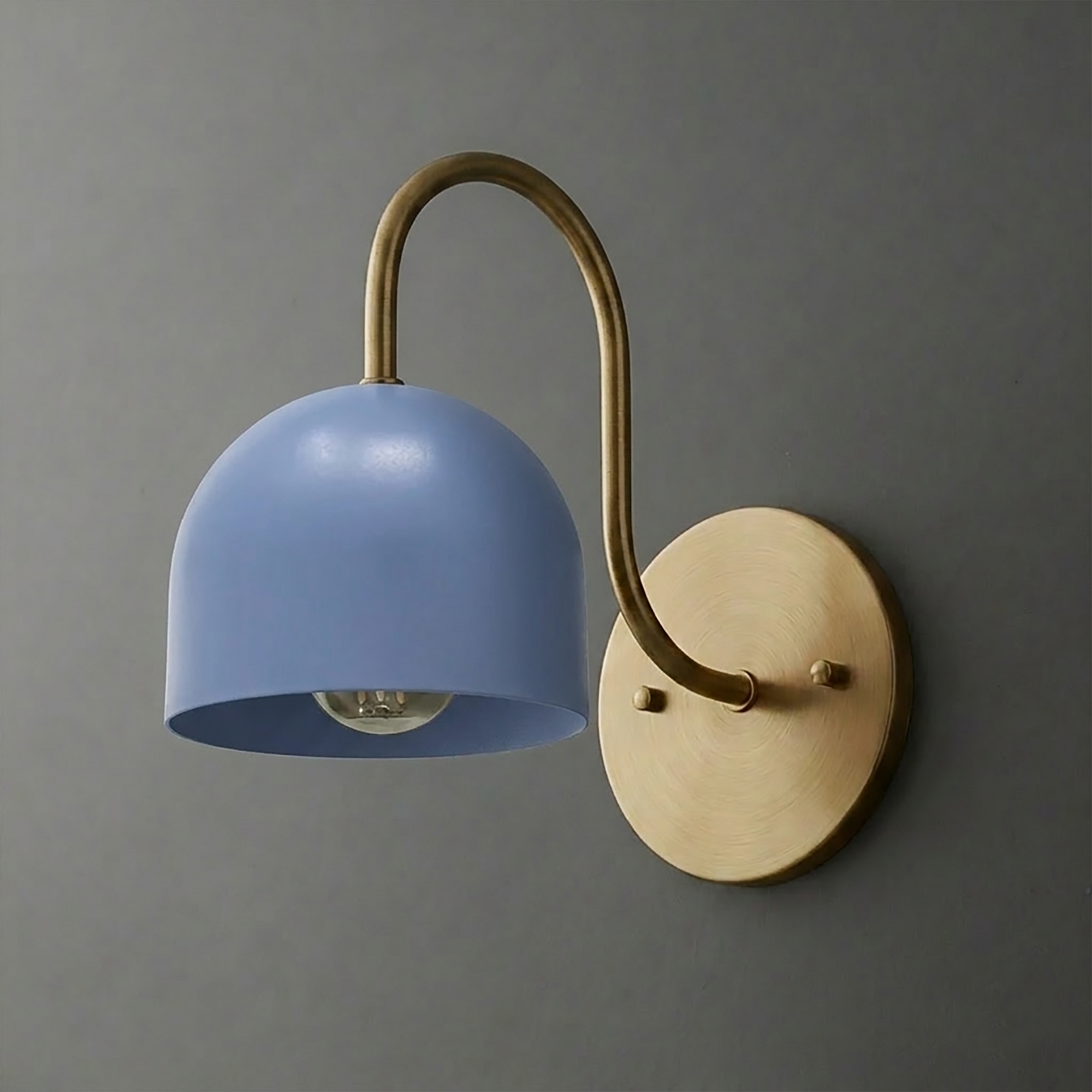 Wall sconce with a matte blue dome shade and curved brushed brass arm and round base plate. - SCONCE MODEL NO. 6308