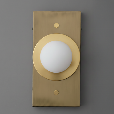 Minimalist antique brass wall sconce with round white globe light and rectangular backplate. - SCONCE MODEL NO. 4474