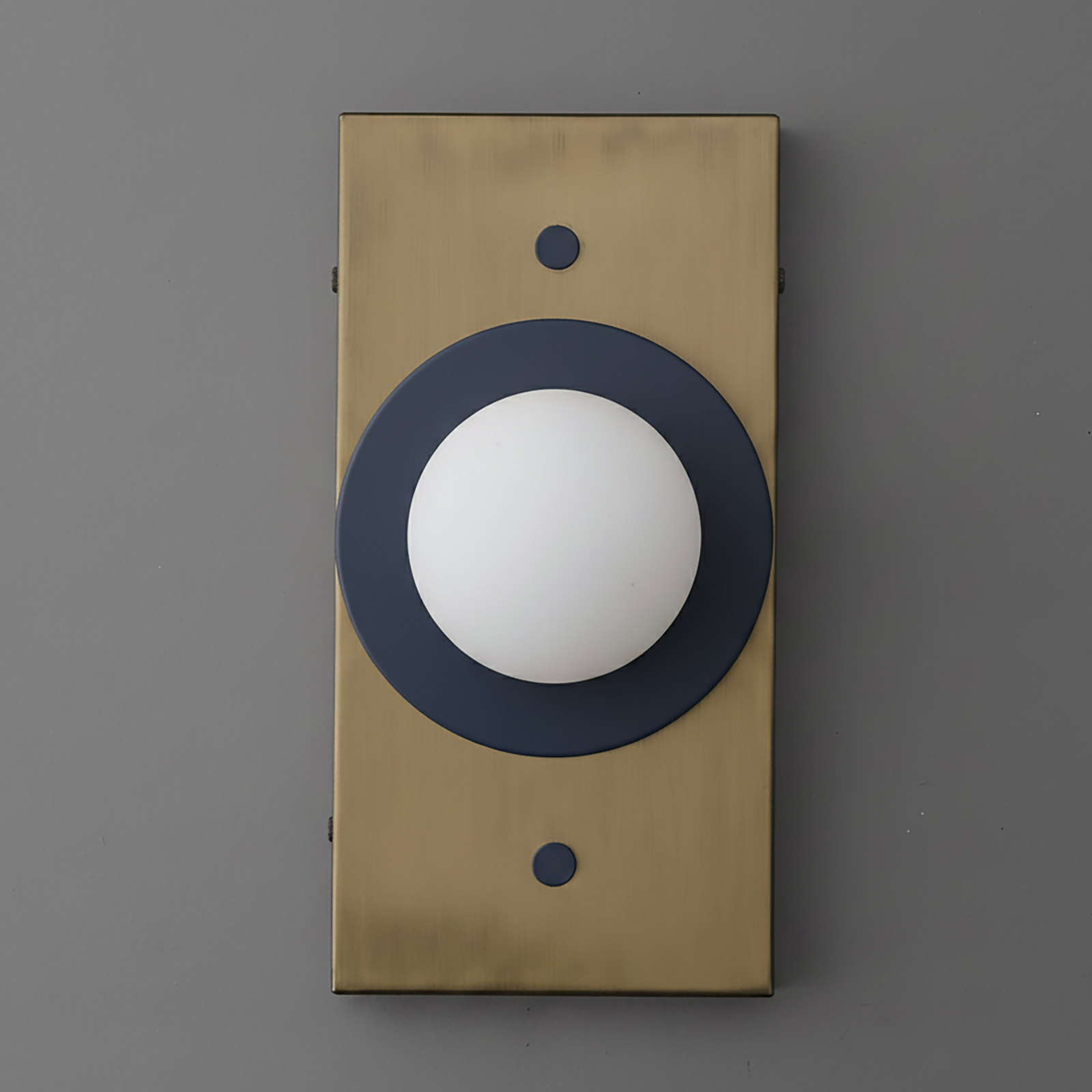 Antique brass rectangular wall sconce with a matte black circular frame and white globe diffuser. - SCONCE MODEL NO. 4474