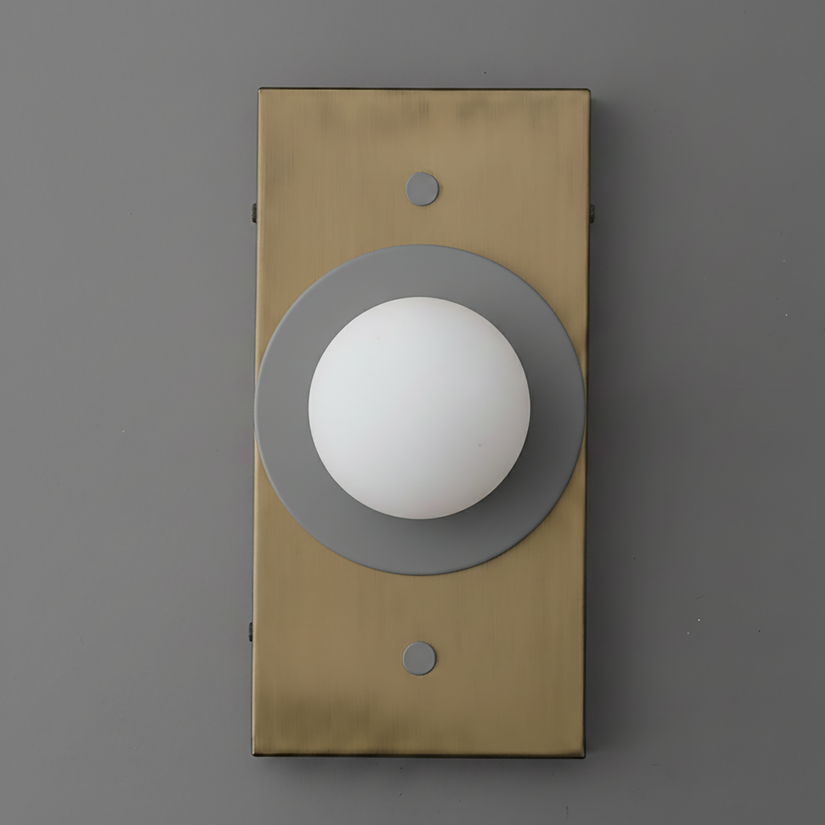 Antique brass rectangular sconce with matte gray circular base and white globe light. - SCONCE MODEL NO. 4474