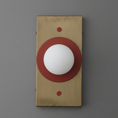 Antique brass rectangular sconce with a round white globe and brick red circular accent ring. - SCONCE MODEL NO. 4474