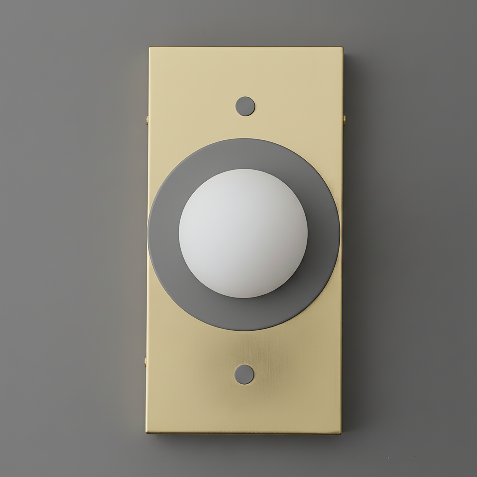 Antique brass rectangular sconce with cream backplate and matte gray circular frame around white globe light. - SCONCE MODEL NO. 4474